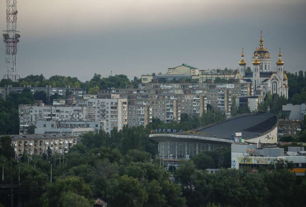 epa10011479 A picture taken during a visit to Mariupol organized by the Russian military shows a general view of the centre of Donetsk, Ukraine, 13 June 2022. According to Eduard Basurin, deputy head of the People's Militia Department of the self-proclaimed Donetsk People's Republic (DPR), the shelling of Donetsk, including the city center, began after Western countries started to supply heavy weapons to Ukraine. On 24 February Russian troops entered Ukrainian territory starting a conflict that has provoked destruction and a humanitarian crisis.  EPA/SERGEI ILNITSKY