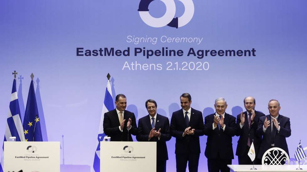epa08098925 Greek Prime Mimnister Kyriakos Mitsotakis (3-L), President of Cyprus Nicos Ananstasiadis (2-L), Israeli Prime Minister Benjamin Netanyahu (3-R), Greek Environment and Energy Minister, Kostis Hatzidakis (2-R), Israeli Energy Minister Yuval Steinitz (R) and Cyprus Energy Minister Yiorgos Lakkotrypis (L) applaud after signing the EastMed agreement at the Zappeion Hall, in Athens, Greece, 02 January 2020. An intergovernmental agreement on the EastMed natural gas pipeline will be signed by Greece, Cyprus and Israel, containing provisions on measures for the protection and security of the pipeline.  EPA/YANNIS KOLESIDIS
