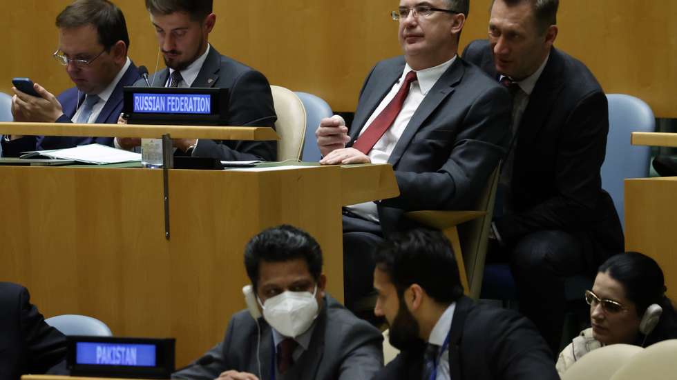 epa09876376 Deputy Permanent Representative of Russia Gennady Kuzmin (C) reacts after the results from voting by the United Nations General Assembly member countries pass a resolution to suspend Russia from Human Rights Council caused by Russia's invasion of Ukraine at United Nations headquarters in New York, New York, USA, 07 April 2022. US Ambassador Linda Thomas-Greenfield made the call for Russia to be stripped of its seat on the 47-member Human Rights Council in the wake of videos and photos of streets in the town of Bucha covered with corpses of what appeared to be civilians.  EPA/JASON SZENES