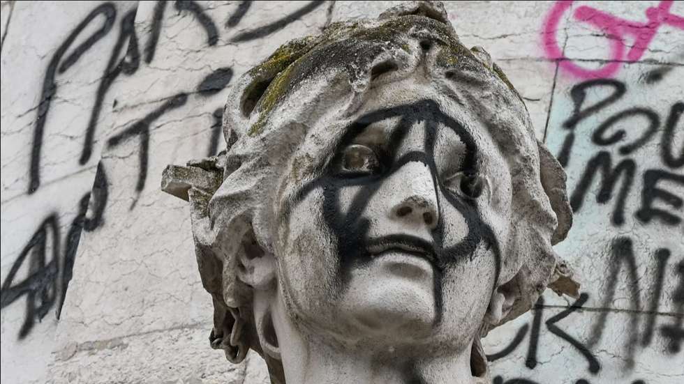 Graffiti on the monument in Place de la République in Paris.