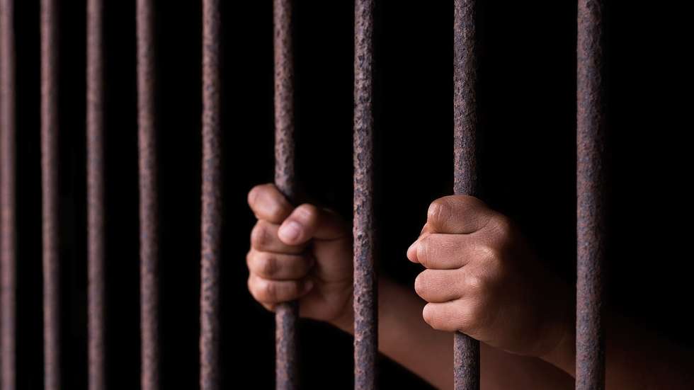 Boy hold cage with eye sad and hopeless