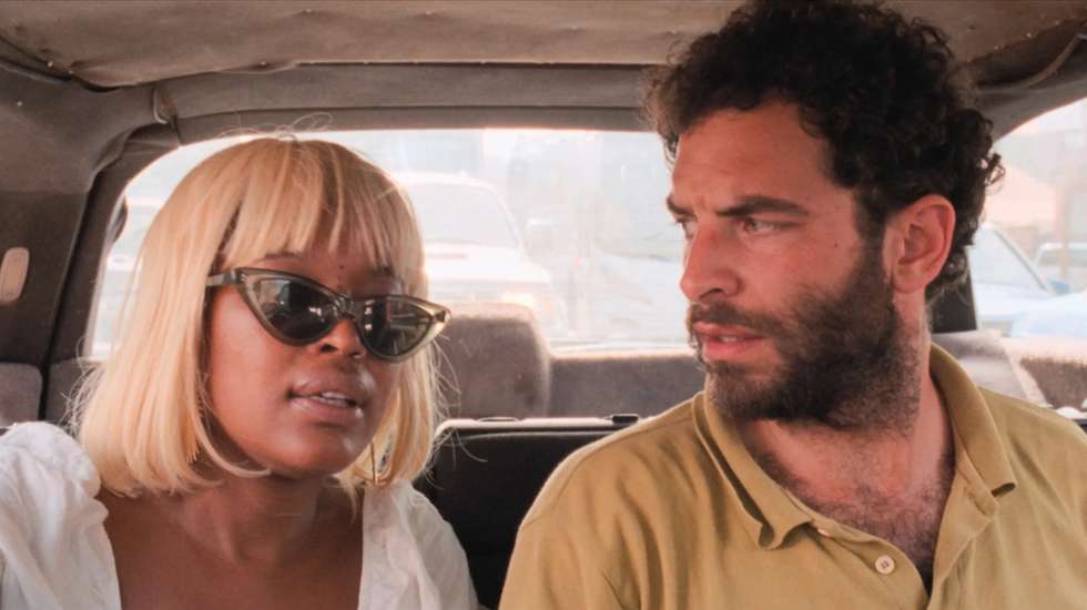 Cléo Diara e Sérgio Coragem num still do filme "O Riso e a Faca"