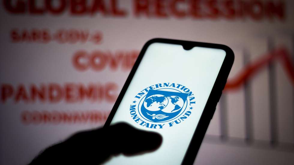 In this photo illustration the International Monetary Fund (