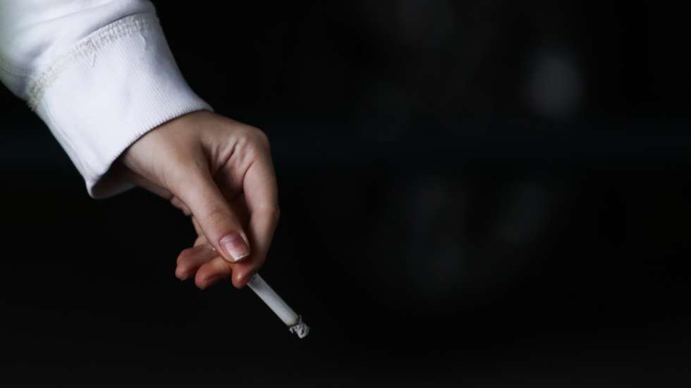 People Smoking Cigarettes
