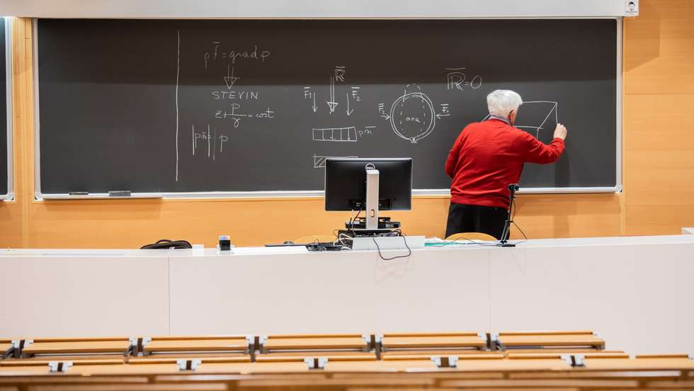 Milan, Hydraulic Lectures transmitted online given by Professor Silvio Franzetti from an empty classroom of the course of Civil Engineering at the Polytechnic of Milan