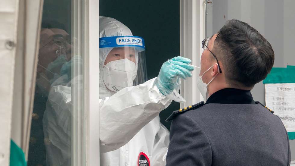 A nurse wearing a personal protective equipment suit (PPE)