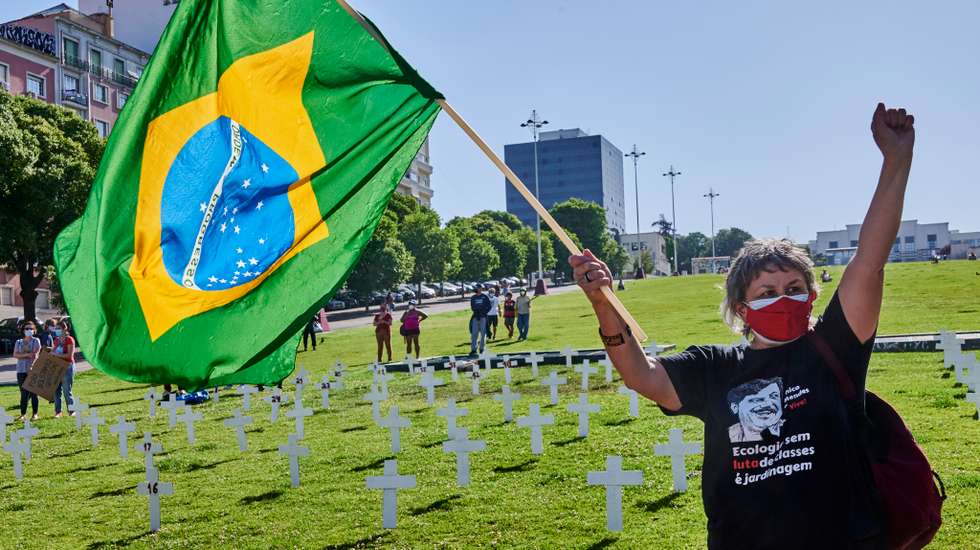 Brazilian Residents Stage A "Bolsonaro Genocide" Protest In Lisbon