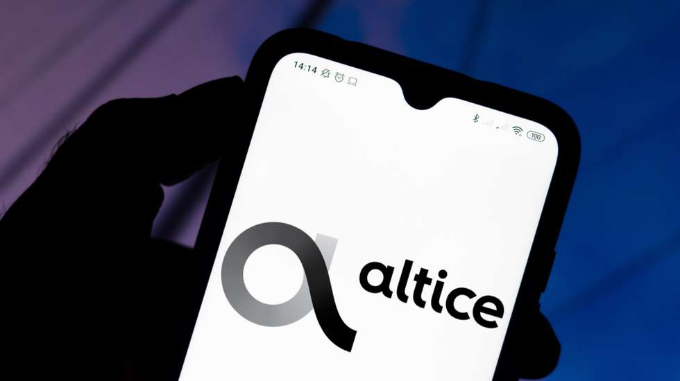 In this photo illustration the Altice USA logo seen