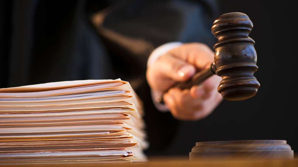Judge holding gavel, close-up
