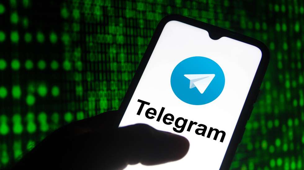 In this photo illustration the Telegram logo seen displayed