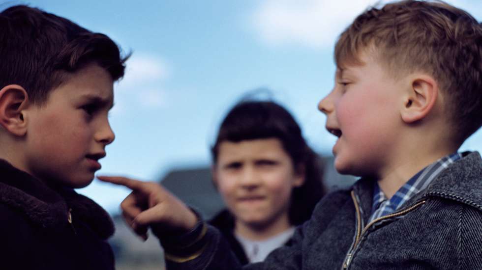Boy Ridiculing Another