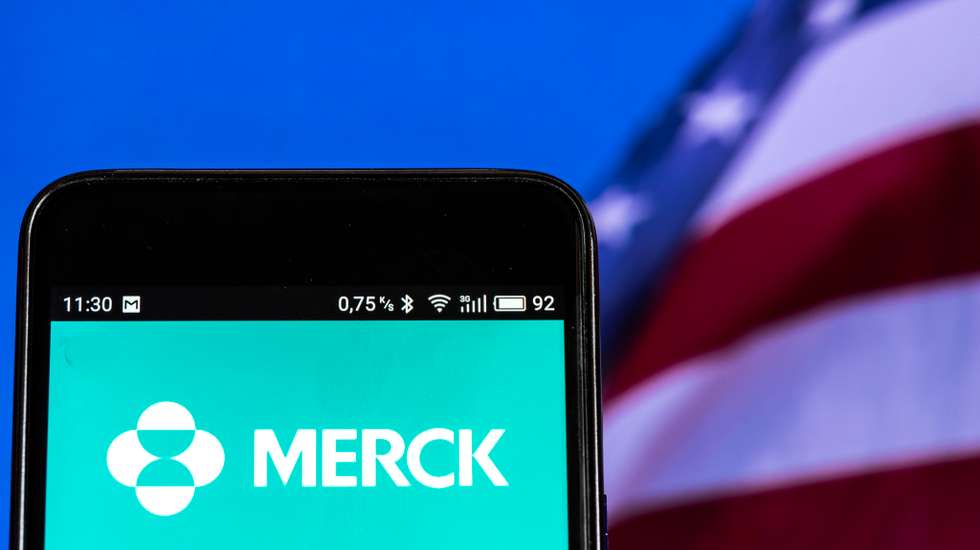 Merck &amp;amp; Co. logo seen displayed on smart phone. Merck &amp;amp;