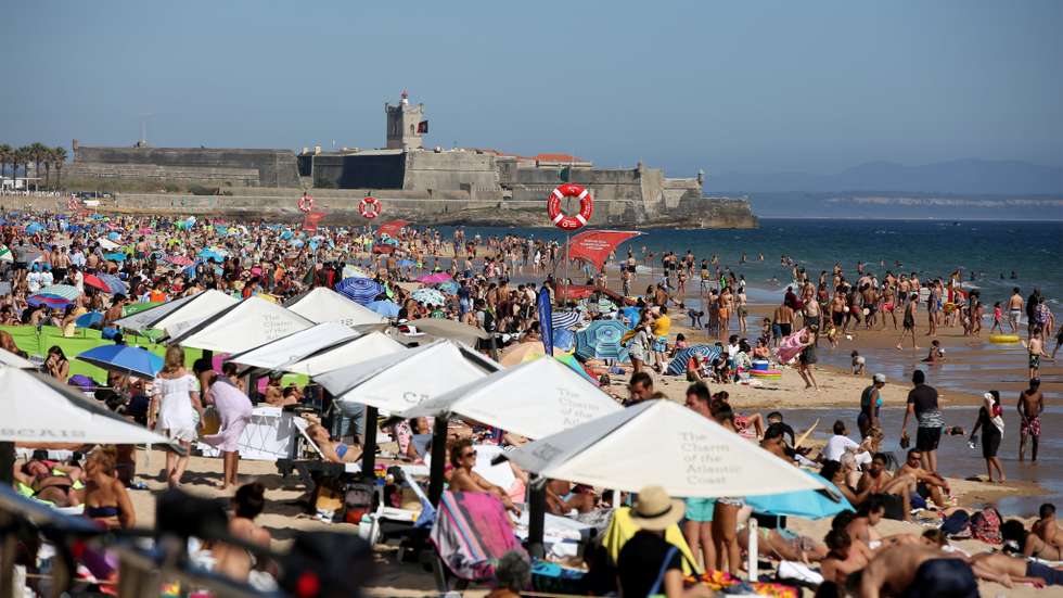 Beachgoers crowd beaches near Lisbon amid COVID-19 pandemic