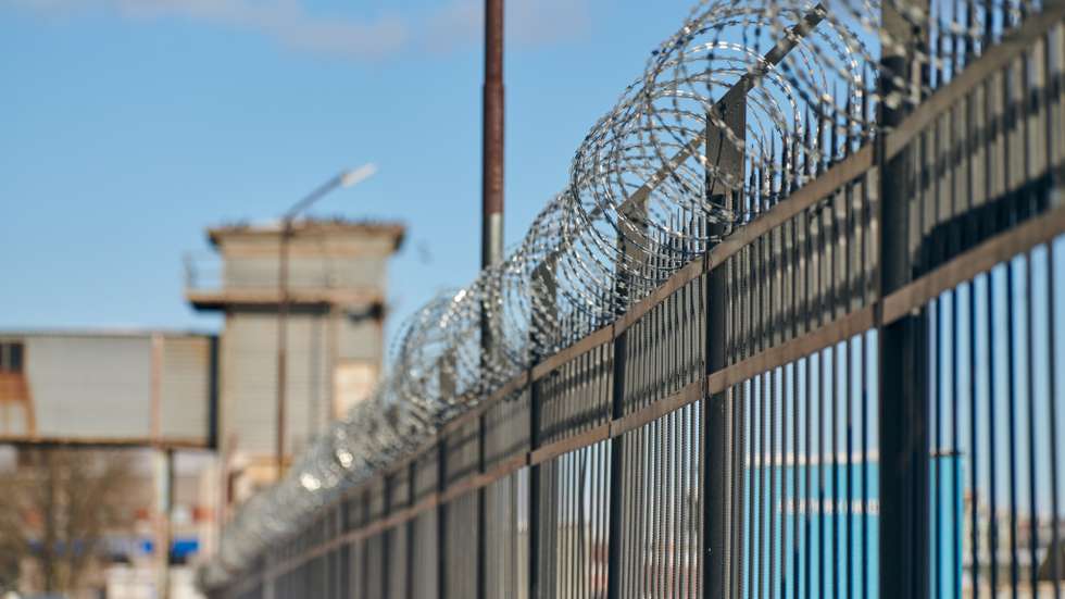 Barbed Wire On Fence, Steel Grating Fence, Metal Fence Wire. Private Area, Protection, Safety