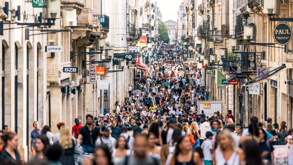 Crowds of people on rue Sainte-Catherine shopping street in Bordeaux, France