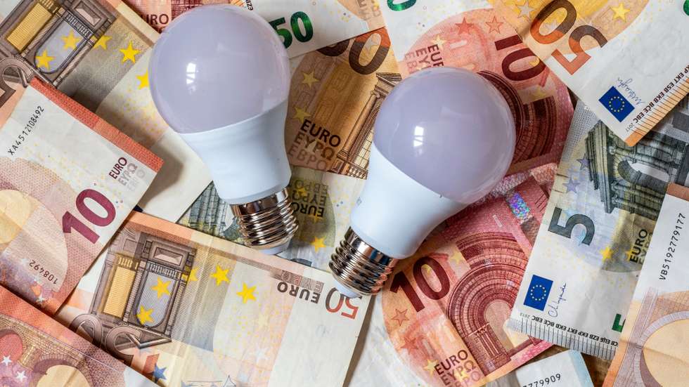Low consumption led light bulb and euro banknotes and coins