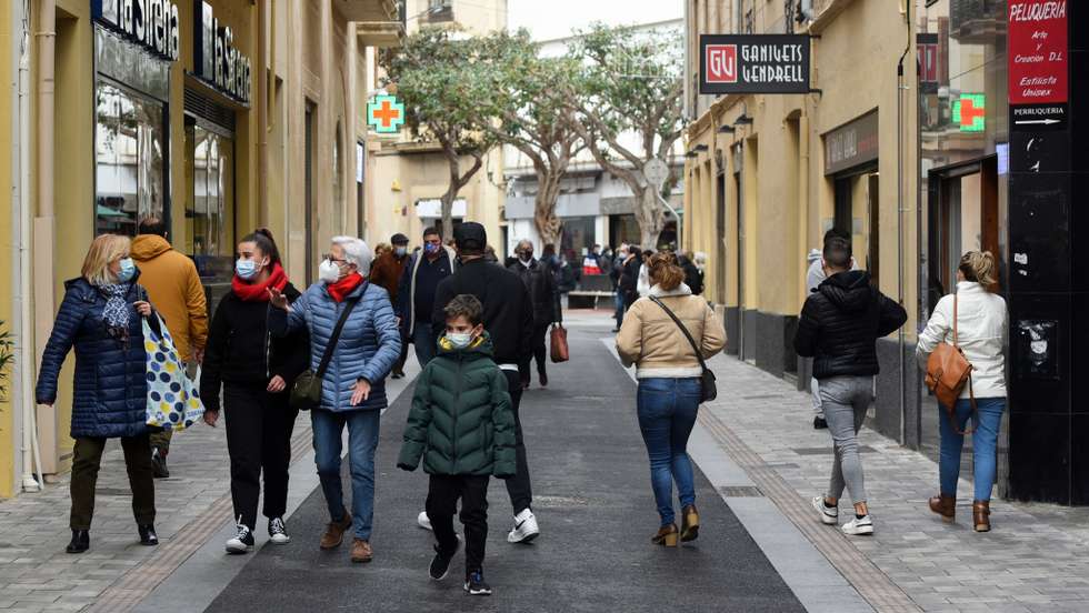 People wearing face masks as precautionary measures against