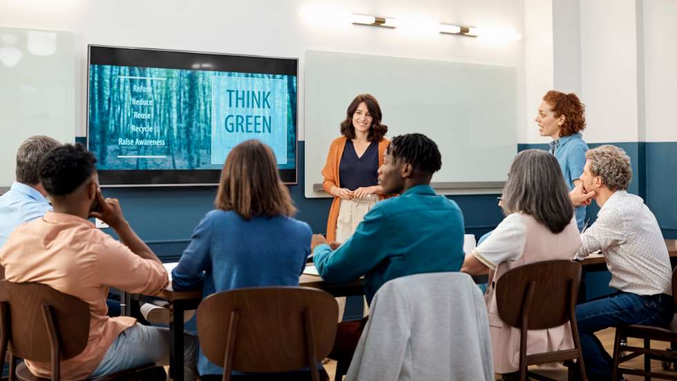 Businesswoman giving presentation in board room