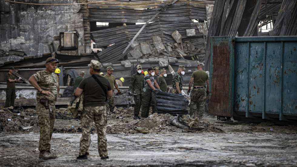 Aftermath of shopping center attack in Ukraine's Kremenchuk