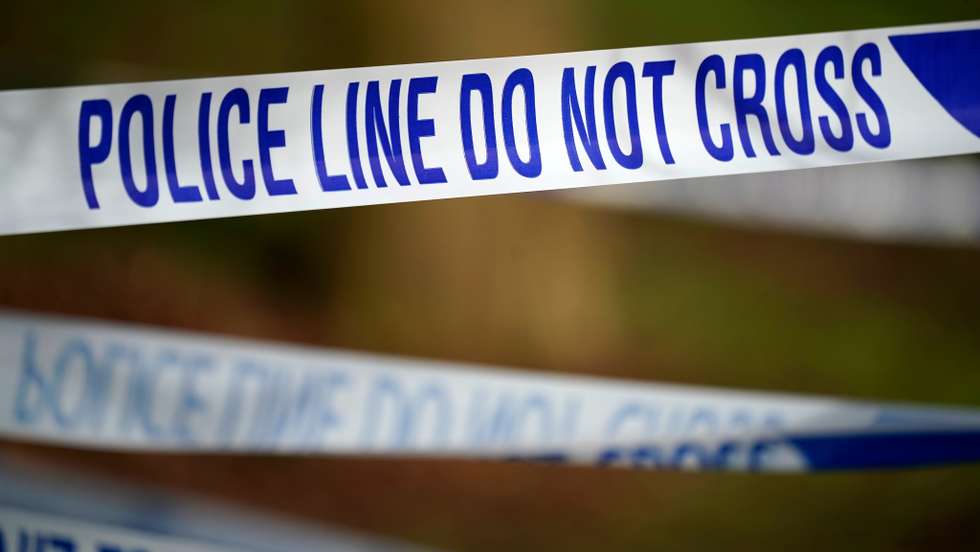 Tributes Are Laid At Burnt Out Home Where Four Children Perished