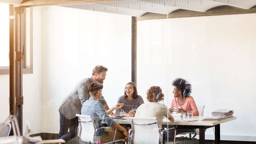 Young business colleagues in board