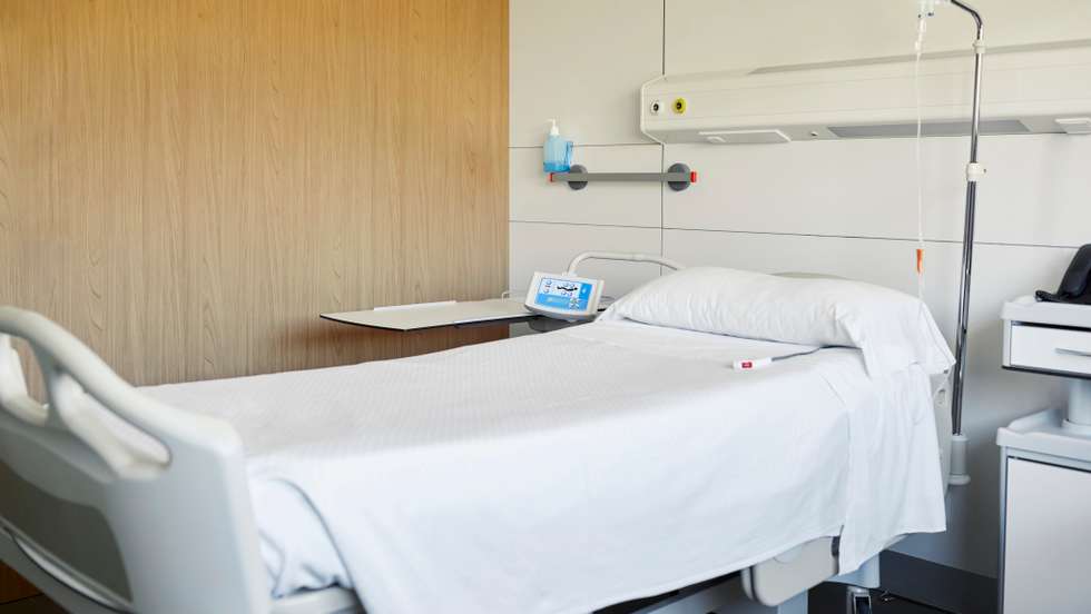 Empty bed in intensive care unit at hospital