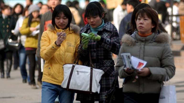 Chinesas trabalham fora de casa mas não chegam ao topo