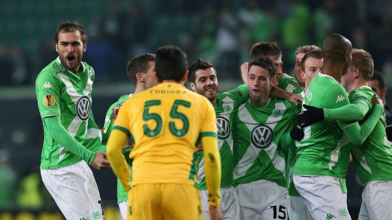 Bas Dost, o gigante holandês à esquerda da imagem, marcou dois golos e já leva 10 marcados em 2015. Só Lionel Messi (14) vai com mais