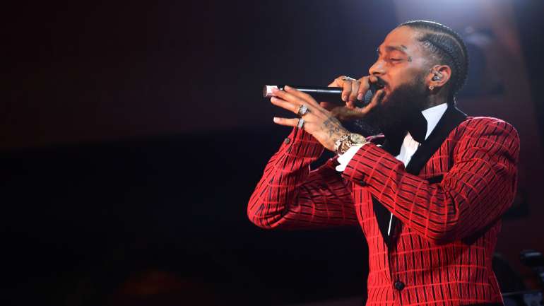 Nipsey Nussle, cujo nome verdadeiro é Ermias Asghedom, começou a carreira em 2005 ao lançar a sua primeira mixtape, Slauson Boy Volume 1