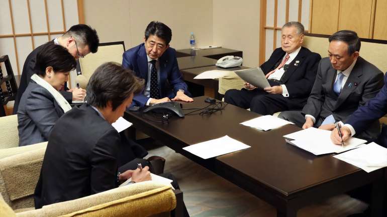 Primeiro-ministro do Japão, Shinzo Abe, liderou chamada em conferência com COI que decidiu adiar Jogos Olímpicos
