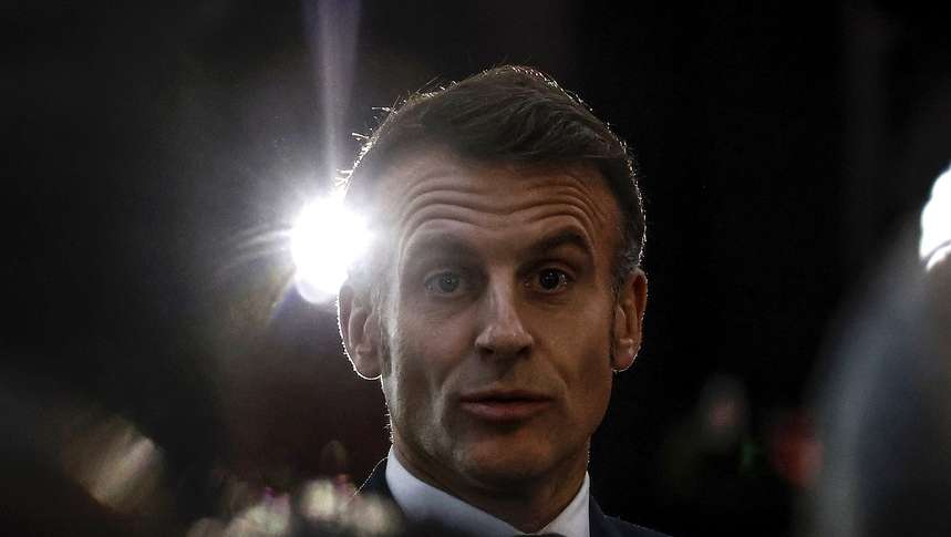epa12583039 French President Emmanuel Macron (C) addresses readers of the daily French newspaper Ouest-France during his visit to Saint-Malo, France, 10 December 2025. The stop in Saint-Malo is one leg of President Macron's tour across France, where he is meeting with regional press readership to discuss democratic challenges in the era of social networks and algorithms.  EPA/YOAN VALAT / POOL