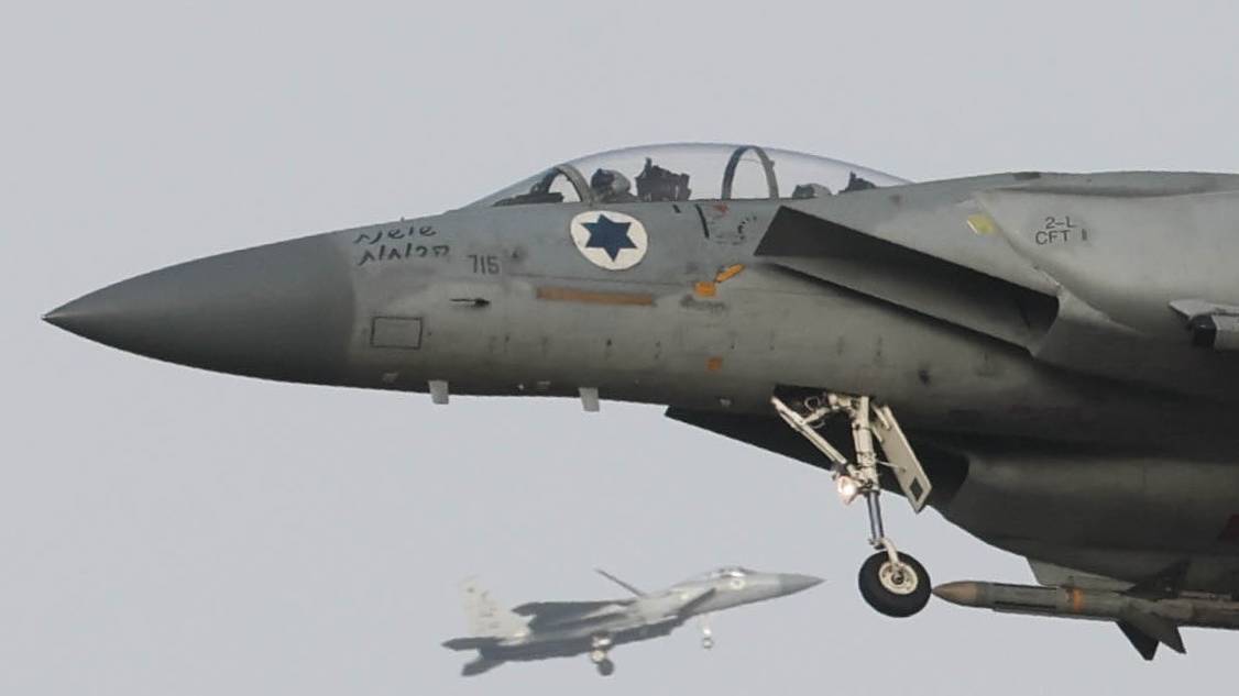 epa11246860 Two Israeli Air Force F15 fighter jets in the air near the city of Gedera, southern Israel, 27 March 2024. The Israeli Defence Forces  announced that the Israeli Air Force is to resume its training program for the current year of war, including increased readiness for conflict in the northern areas. More than 30,000 Palestinians and over 1,300 Israelis have been killed, according to the Palestinian Health Ministry and the Israel Defense Forces (IDF), since Hamas militants launched an attack against Israel from the Gaza Strip on 07 October 2023, and the Israeli operations in Gaza and the West Bank which followed it.  EPA/ABIR SULTAN