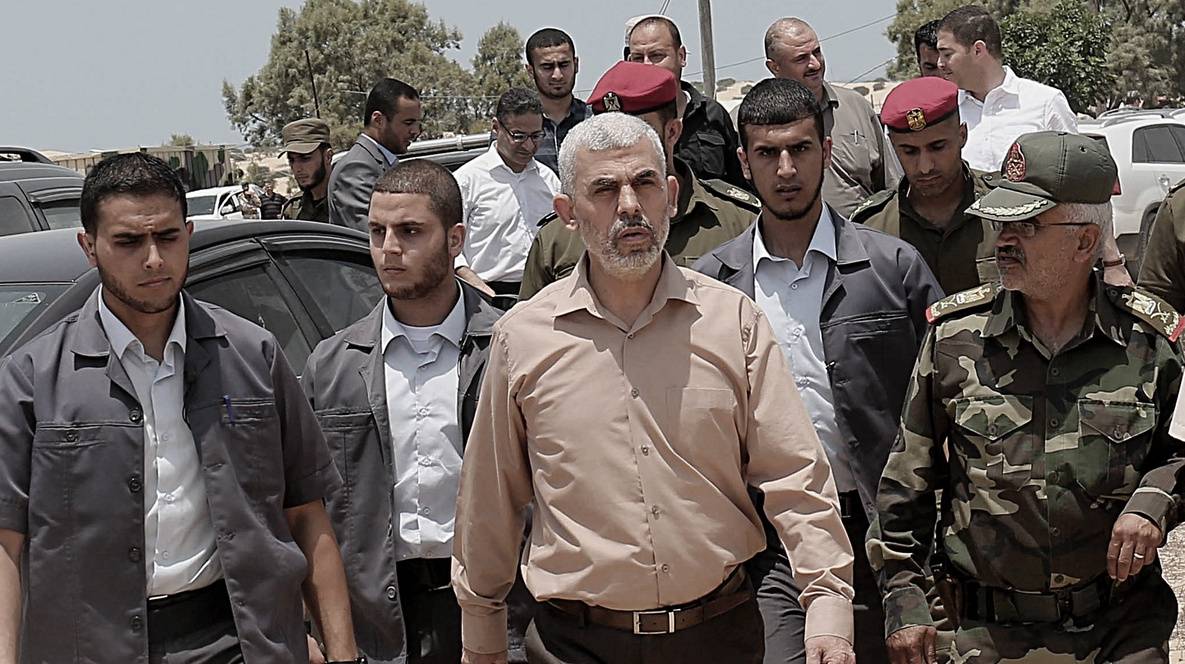 epa06070534 The new leader of Hamas movement in Gaza Strip Yahya Sinwar (3-L) visits Rafah border between Egypt and Gaza Strip in the southern Gaza Strip, 06 July 2017. According to reports, the Hamas movement said it was agreed with Egyptian officials to create a 12- kilometer corridor 100 meters wide as part of the group&#039;s efforts to combat extremists and improve ties with Cairo.  EPA/STRINGER