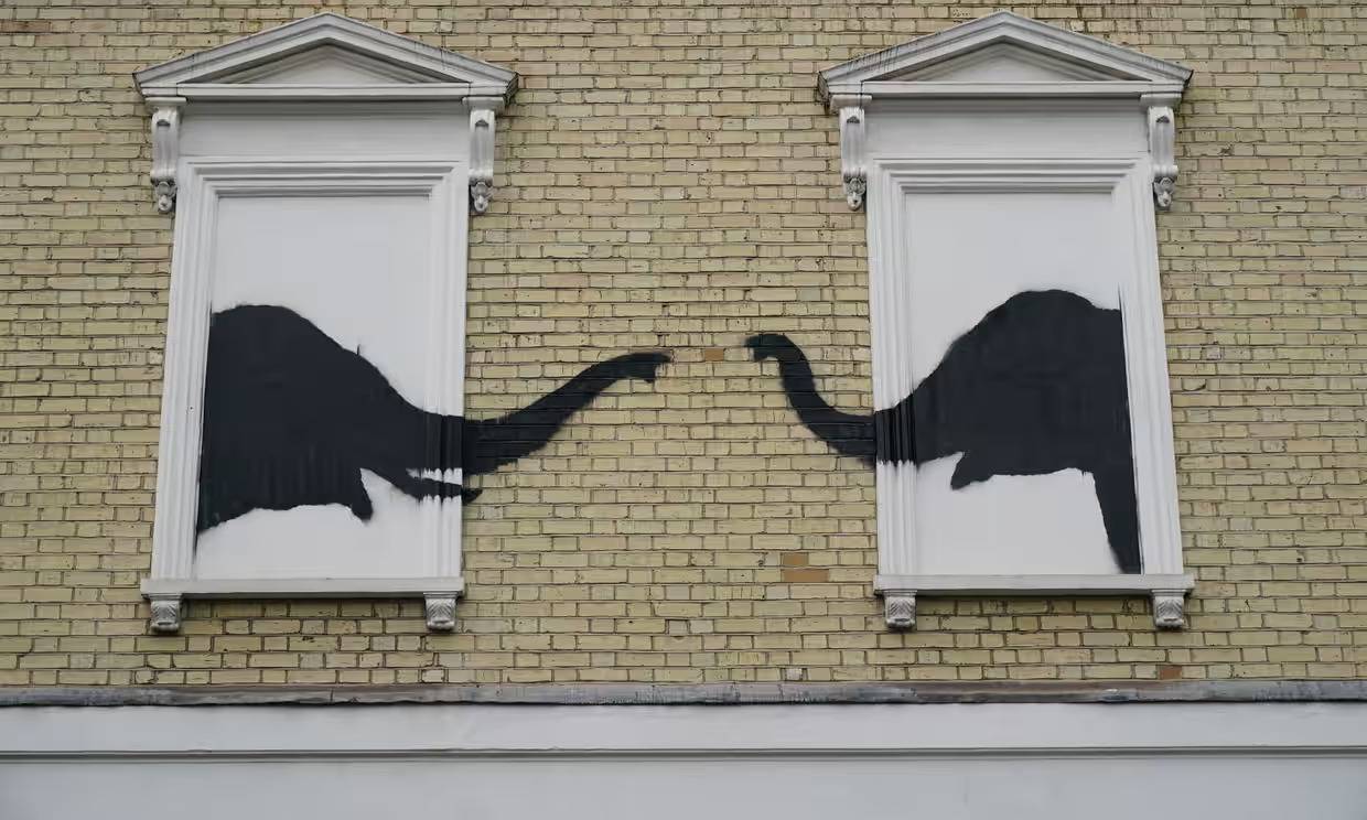 The latest artwork depicts two elephants poking their heads out of blocked-out windows in Chelsea, south-west London