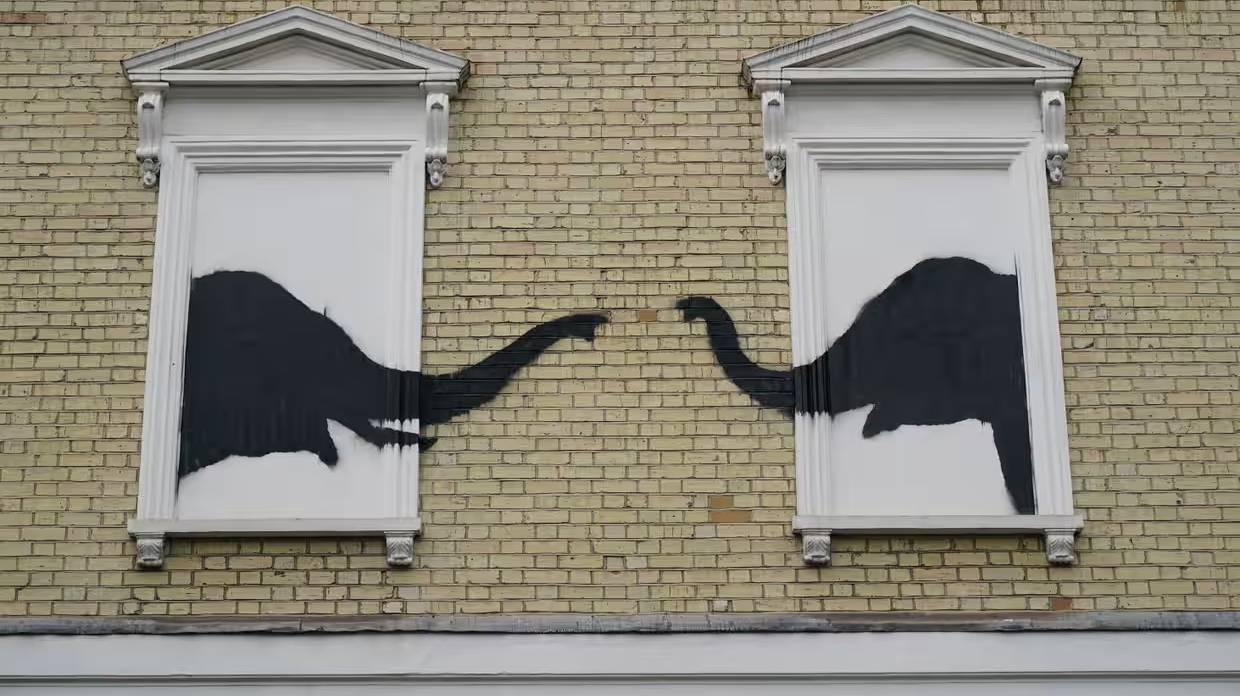 The latest artwork depicts two elephants poking their heads out of blocked-out windows in Chelsea, south-west London