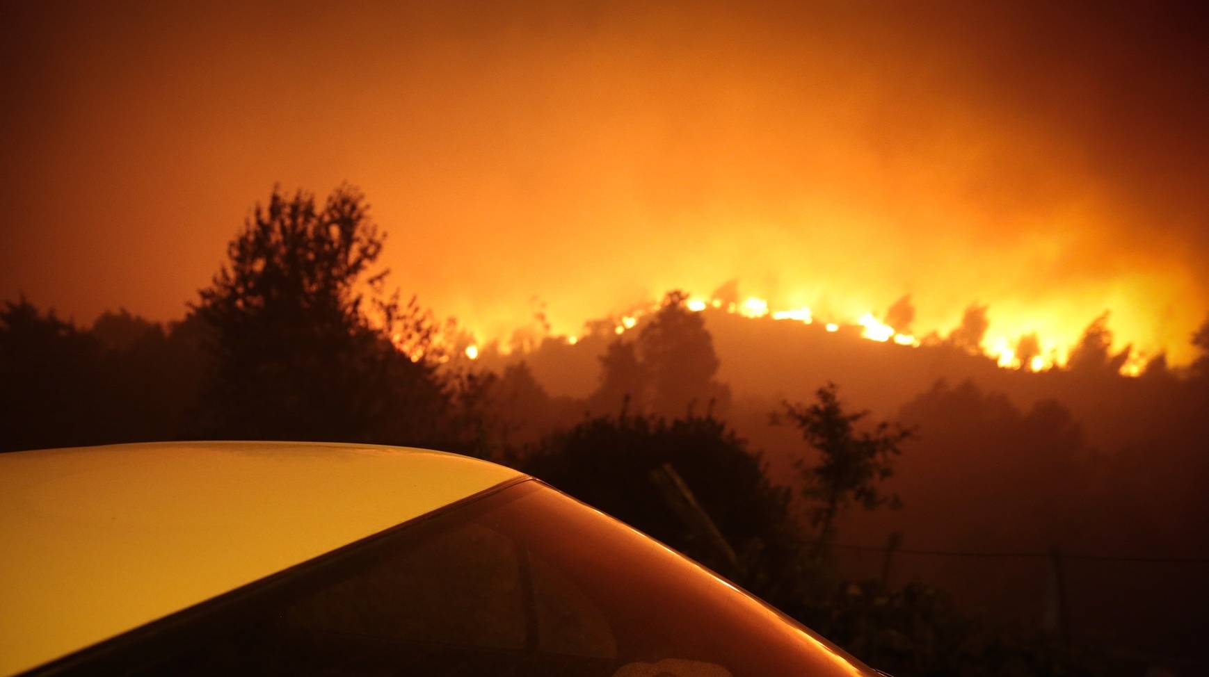 Nuno André Ferreira foi galardoado com uma menção honrosa na categoria de Fotografia do Ano nos prémios de fotojornalismo Estação Imagem 2021, com a imagem de uma criança sentada dentro de um carro perto de um incêndio florestal em Oliveira de Frades em  setembro de 2020. Coimbra 12 de junho de 2021. NUNO ANDRÉ FERREIRA / ESTAÇÃO IMAGEM / LUSA +++PROIBIDA A COMERCIALIZAÇÃO+++