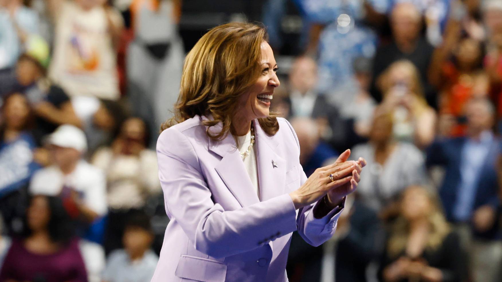 epa11544433 Democratic presidential candidate Vice President Kamala Harris acknowledges the crowd as she takes the stage during a rally with Democratic vice presidential candidate Minnesota Governor Tim Walz (Not Pictured) at the University of Nevada Las Vegas&#039; Thomas and Mack Center in Las Vegas, Nevada, USA, 10 August 2024.  EPA/BIZUAYEHU TESFAYE