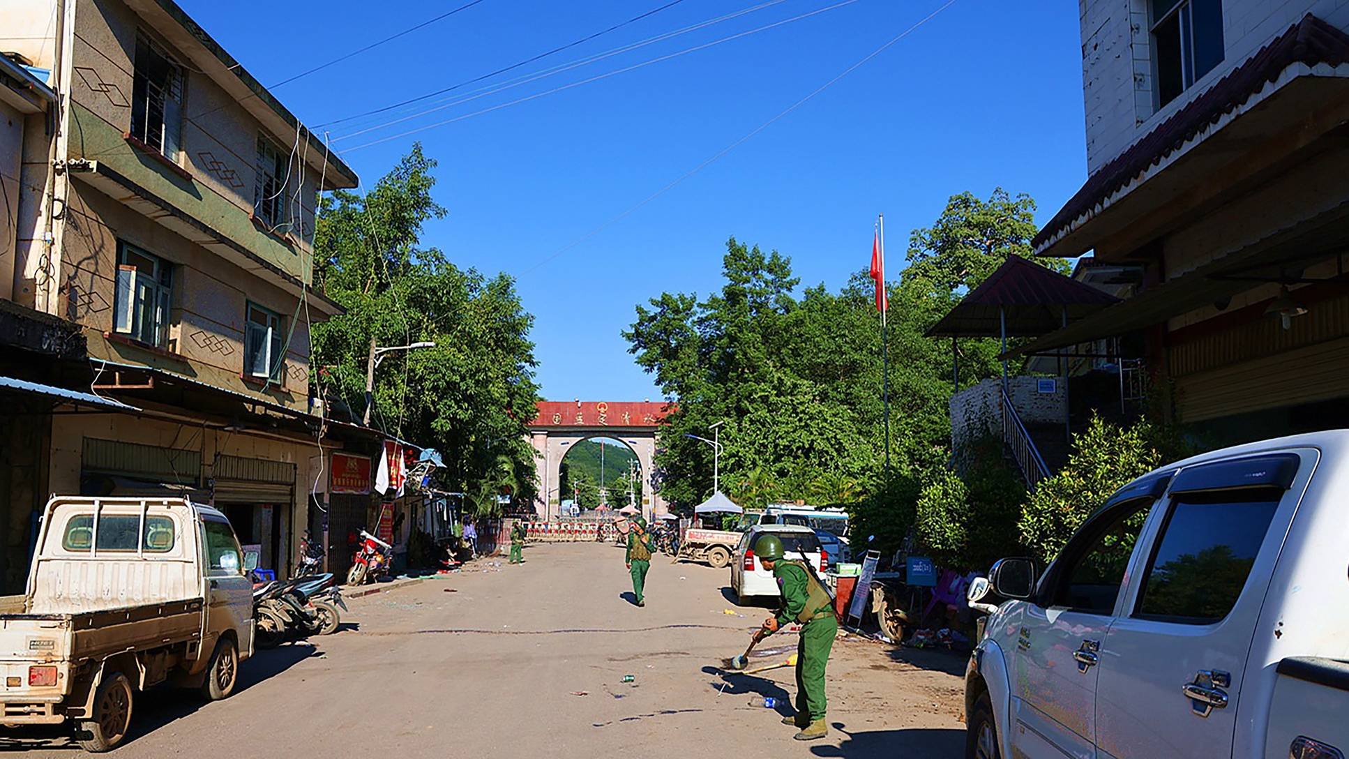 epa10956294 A handout photo made available by the KoKang media shows the Myanmar National Democratic Alliance Army (MNDAA) soldiers clean the road near the border gate in Chinshwehaw, northern Shan State, Myanmar, 29 October 2023 (issued 03 November 2023). Myanmar&#039;s military has lost control of Chinshwehaw, a strategic northern town along the border with China, following days of heavy fighting with three ethnic armed groups, according Myanmar military spokesman Zaw Min Tun in a statement on 01 November 2023. Ethnic armed groups the Myanmar National Democratic Alliance Army (MNDAA), the Ta&#039;ang National Liberation Army (TNLA) and the Arakan Army (AA) said they had captured several military outposts and blocked key roads linking Myanmar to China.  EPA/HANDOUT HANDOUT   HANDOUT EDITORIAL USE ONLY/NO SALES HANDOUT EDITORIAL USE ONLY/NO SALES