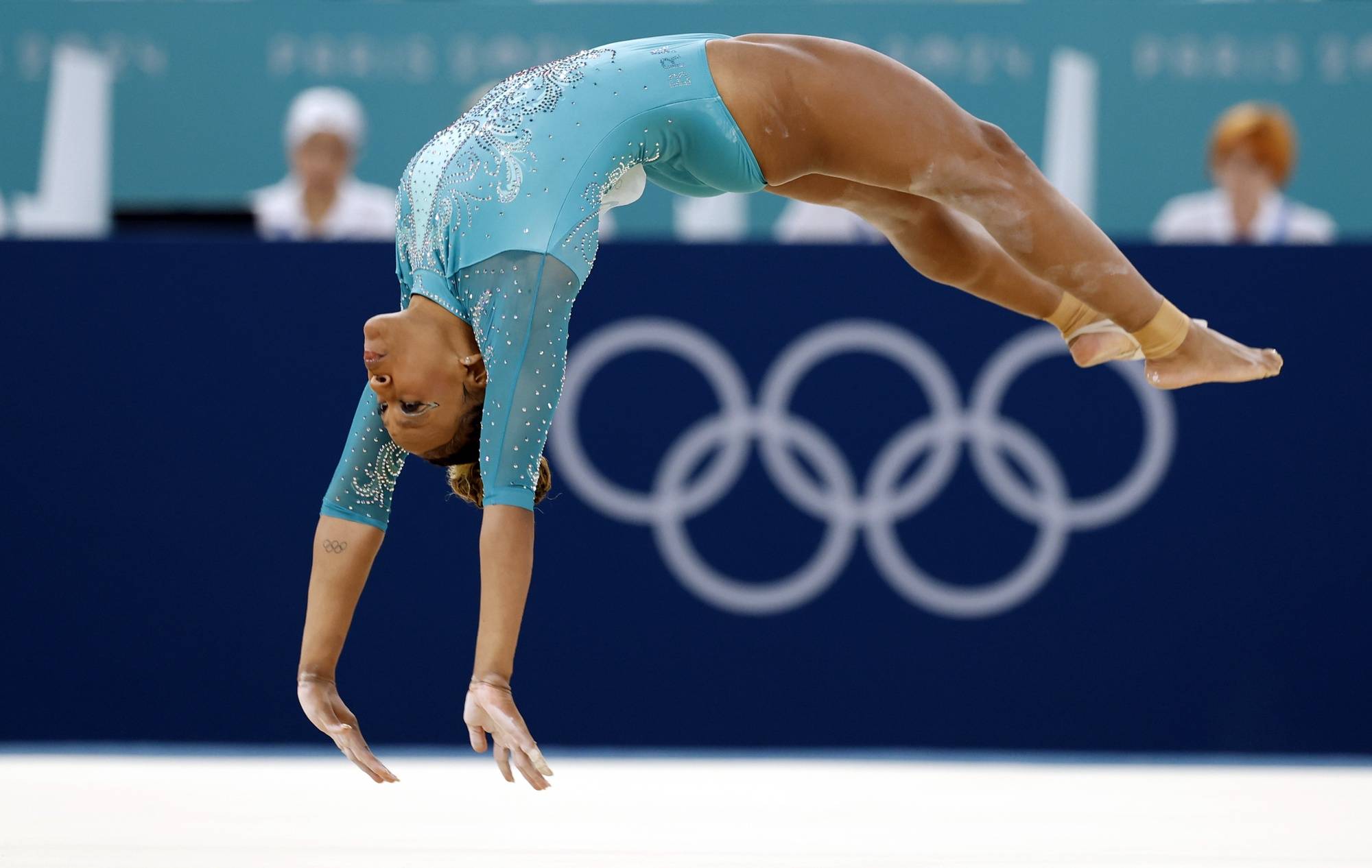 epa11527490 Rebeca Andrade of Brazil competes in the Women Floor Exercise final of the Artistic Gymnastics competitions in the Paris 2024 Olympic Games, at the Bercy Arena in Paris, France, 05 August 2024.  EPA/CAROLINE BREHMAN