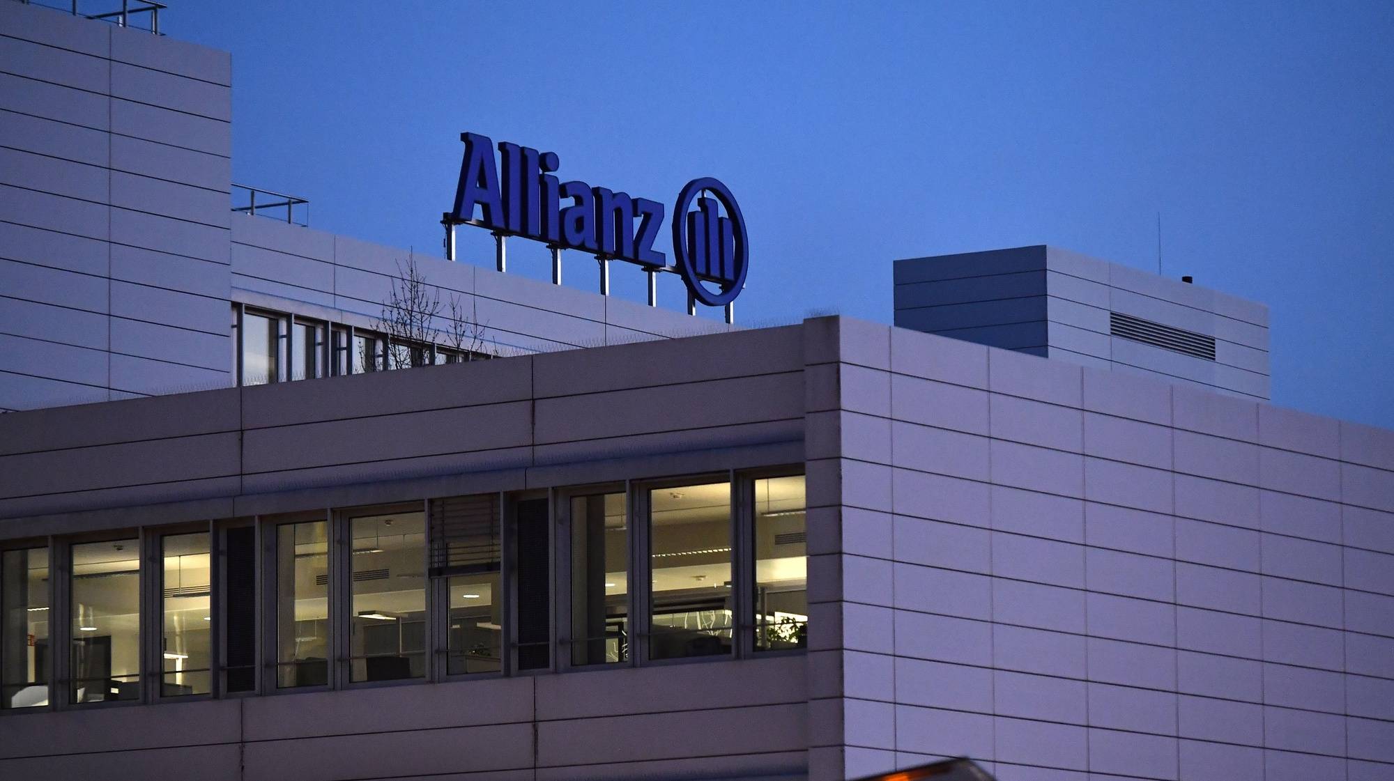 epa10497357 Allianz logo is seen on the Headquarter of the Allianz Global Corporate &amp; Specialty SE in Munich, Germany, 01 March 2023. The Annual Reports 2022 of Allianz Group and Allianz SE will be released on 03 March 2023.  EPA/ANNA SZILAGYI