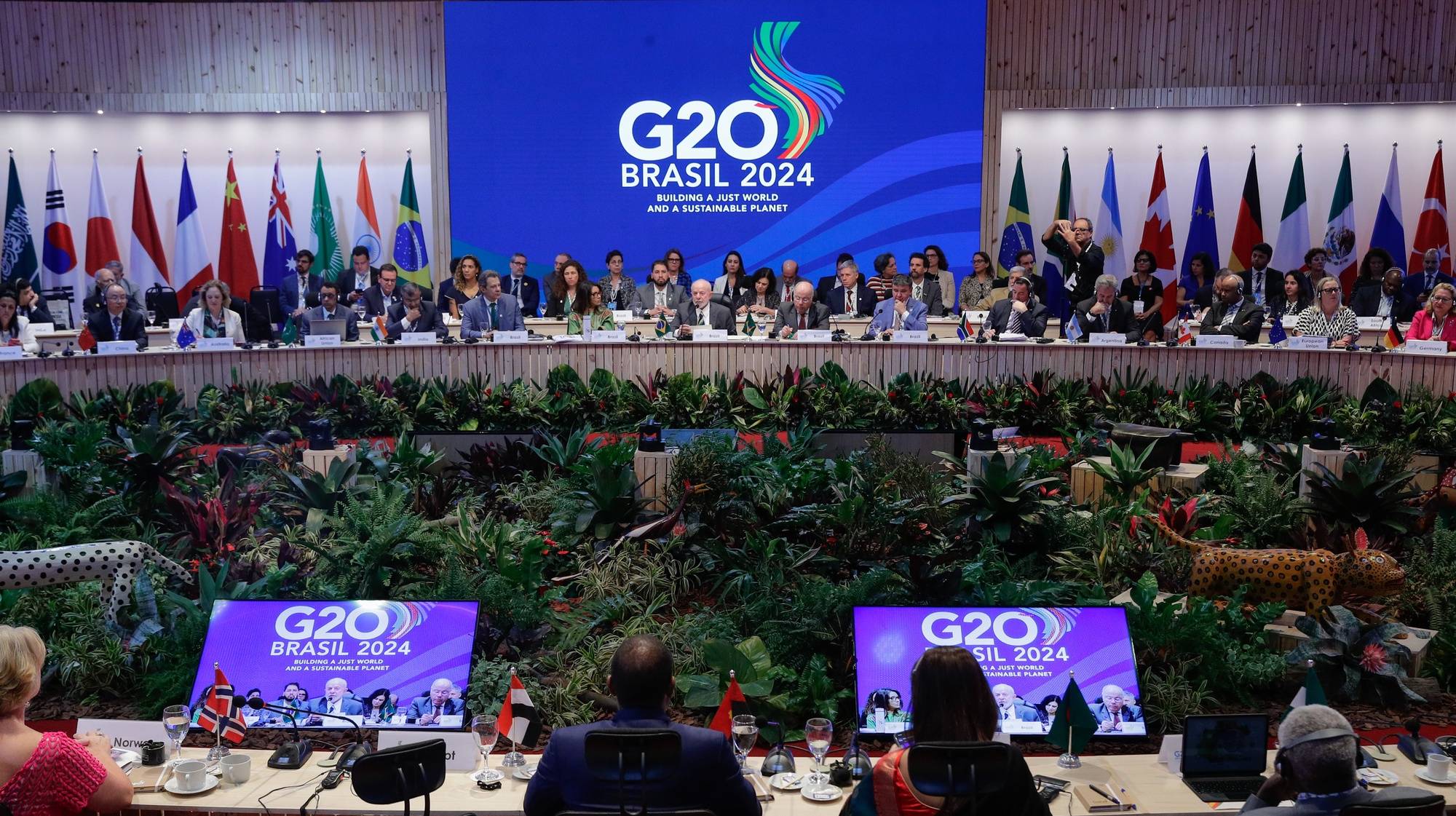 epa11494290 The President of Brazil, Luiz Inacio Lula da Silva (C), speaks during the opening of the Global Alliance against Hunger and Poverty meeting at the G20 Brazil 2024, held at the headquarters of the NGO Acao da Cidadania in Rio de Janeiro, Brazil, 24 July 2024. Lula da Silva introduced the Global Alliance against Hunger and Poverty and expressed regret that hunger continues to be the most challenging issue for humanity in the 21st century.  EPA/ANDRE COELHO