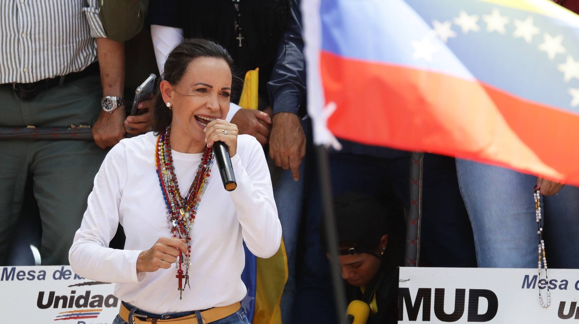 epa11523475 Venezuelan opposition leader Maria Corina Machado speaks at a protest against the official results of the country&#039;s 28 July presidential elections in Caracas, Venezuela, 03 August 2024. The Venezuelan National Electoral Council (CNE) on 02 August 2024 proclaimed Nicolas Maduro as re-elected president of Venezuela.  EPA/RONALD PENA R.