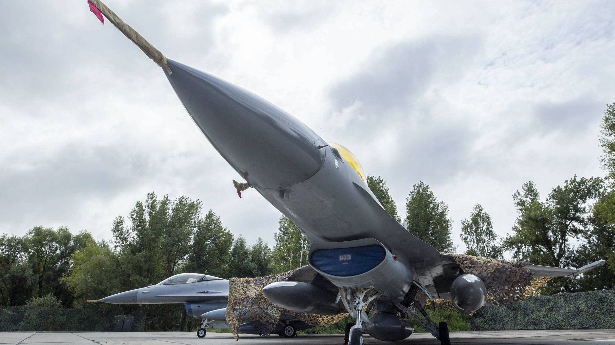 epa11525685 A handout picture made available by the Presidential Press Service shows American single-engine supersonic multirole fighter F-16 jets during a ceremony to mark Air Force Day of the Armed Forces of Ukraine at an undisclosed location in Ukraine, 04 August 2024, amid the Russian invasion.  EPA/PRESIDENTIAL PRESS SERVICE HANDOUT  HANDOUT EDITORIAL USE ONLY/NO SALESHANDOUT EDITORIAL USE ONLY/NO SALES