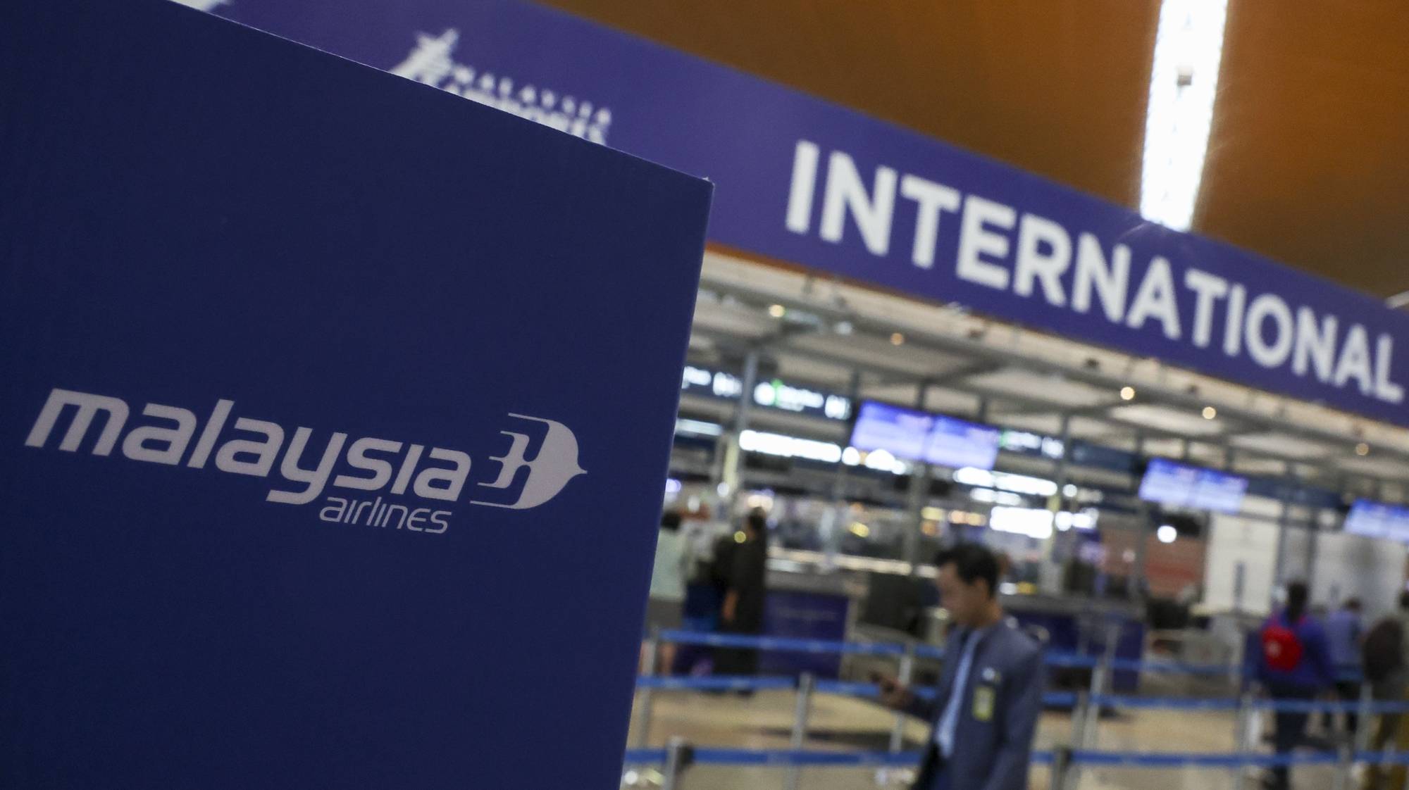 epa11482877 A Malaysia Airlines counter at the Kuala Lumpur International Airport (KLIA) in Sepang, outside Kuala Lumpur, Malaysia, 17 July 2024, on the 10th anniversary of the Malaysia Airlines MH17 flight from Amsterdam to Kuala Lumpur, which was shot down over eastern Ukraine, killing all 298 people on board.  EPA/FAZRY ISMAIL