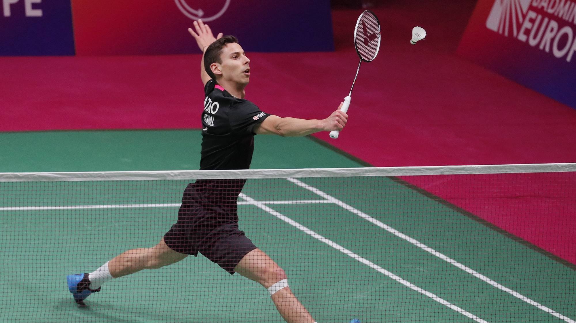 epa09165602 Bernardo Atilano of Portugal in action during  the menâ€™s singles match against Kalle Koljonen of Finland during the European Badminton Championships in Kiev, Ukraine, 28 April 2021.  EPA/SERGEY DOLZHENKO