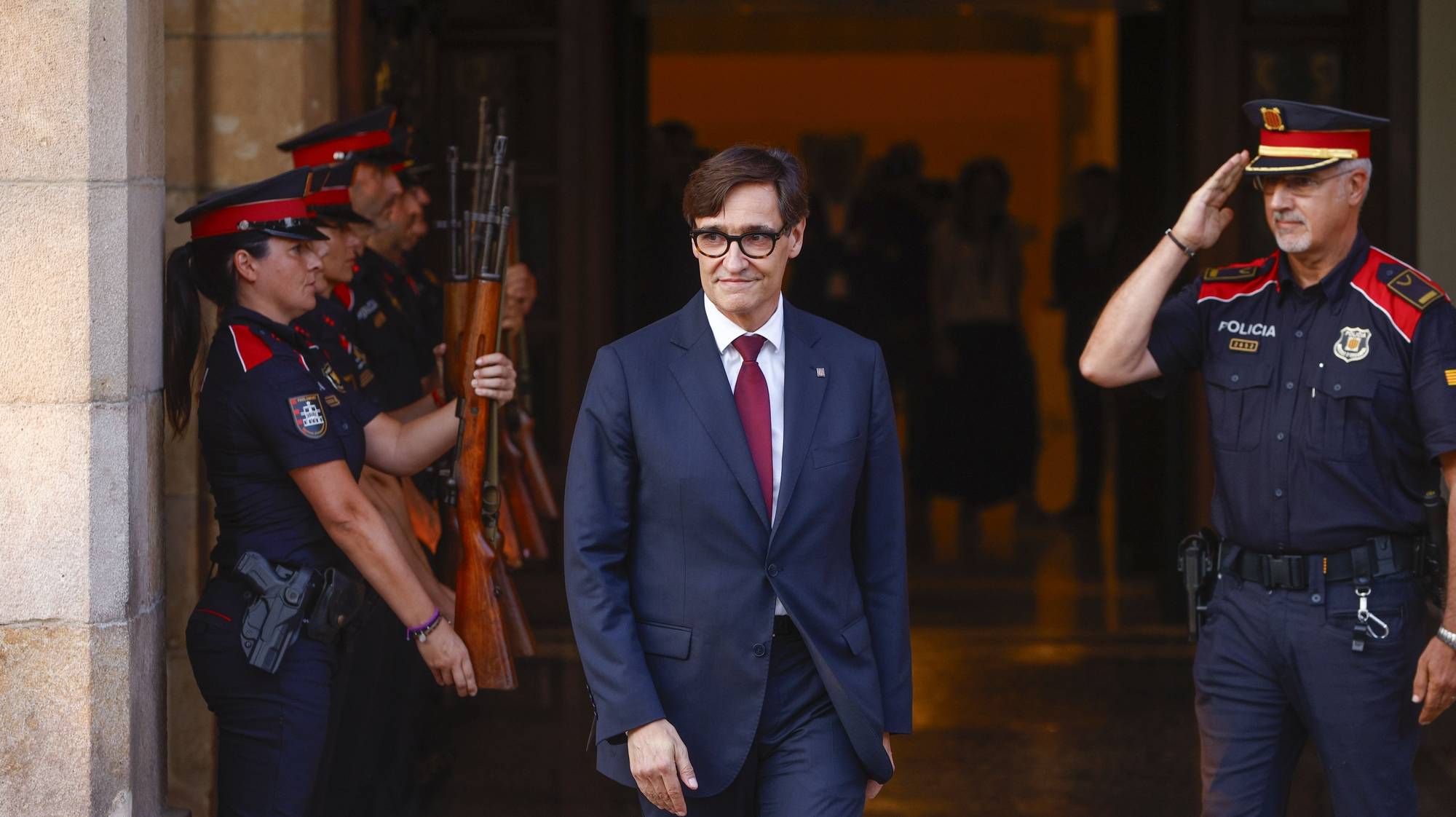 epa11537677 Socialist leader Salvador Illa leaves the Parliament after being invested as the Catalonia&#039;s new president in Barcelona, Spain, 08 August 2024.  The plenary session of the Parliament invested the Socialist leader Salvador Illa as the new president of the Generalitat, the government of Catalonia, with 68 votes in favor and 66 against. The Mossos d&#039;Esquadra was deployed early morning on 08 August to secure access to the Parliament for the investiture of Salvador Illa.  EPA/QUIQUE GARCIA