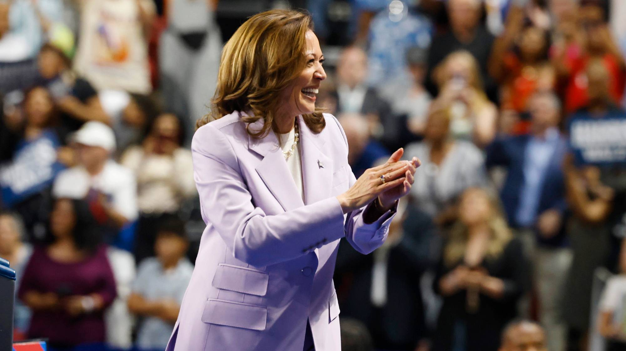 epa11544433 Democratic presidential candidate Vice President Kamala Harris acknowledges the crowd as she takes the stage during a rally with Democratic vice presidential candidate Minnesota Governor Tim Walz (Not Pictured) at the University of Nevada Las Vegas&#039; Thomas and Mack Center in Las Vegas, Nevada, USA, 10 August 2024.  EPA/BIZUAYEHU TESFAYE