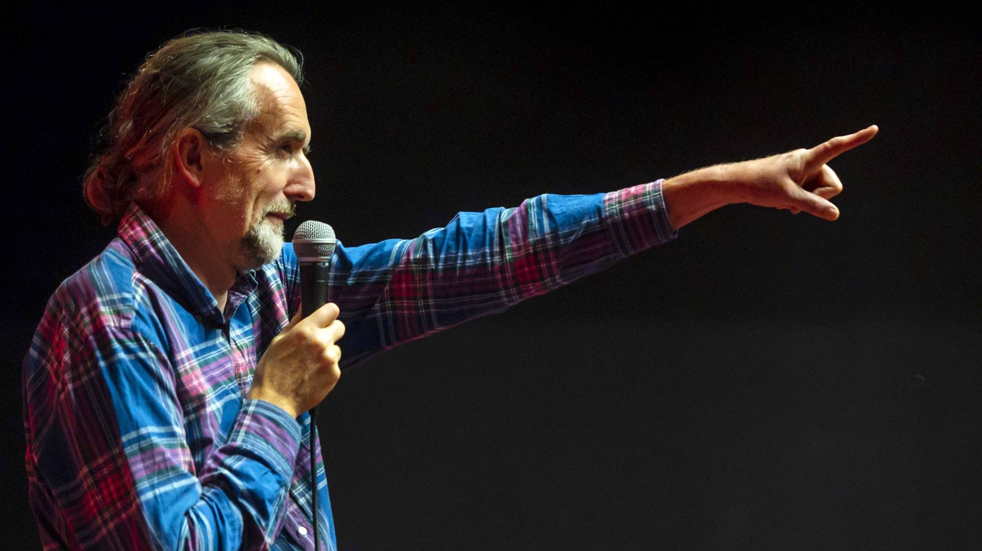 epa07837761 (FILE) - British environmental activist and co-founder of Extinction Rebellion Roger Hallam speaks during a meeting at Filmtheater Kriterion in Amsterdam, The Netherlands, 10 August 2019 (reissued 12 September 2019). According to media reports, Hallam has been arrested by British police on 12 September 2019.  EPA/EVERT ELZINGA *** Local Caption *** 55389004