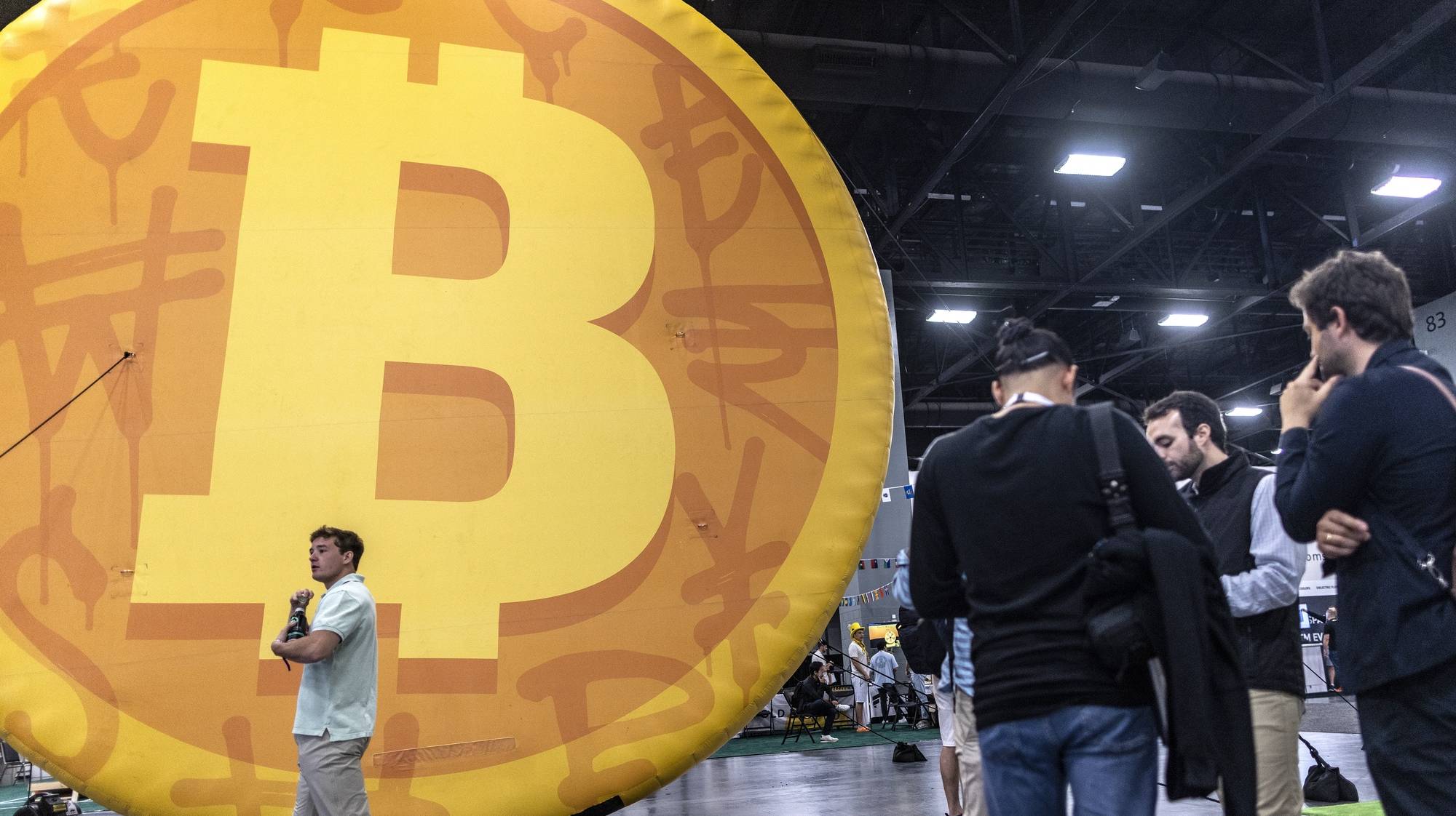 epa10637199 People attend the Bitcoin 2023 conference at the Miami Beach Convention Center in Miami Beach, Florida, USA, 18 May 2023. Bitcoin 2023 is the biggest bitcoin event in the world that features, for its 2023 edition, about 150 speakers and a showcase of more than 2,000 companies.  EPA/CRISTOBAL HERRERA-ULASHKEVICH