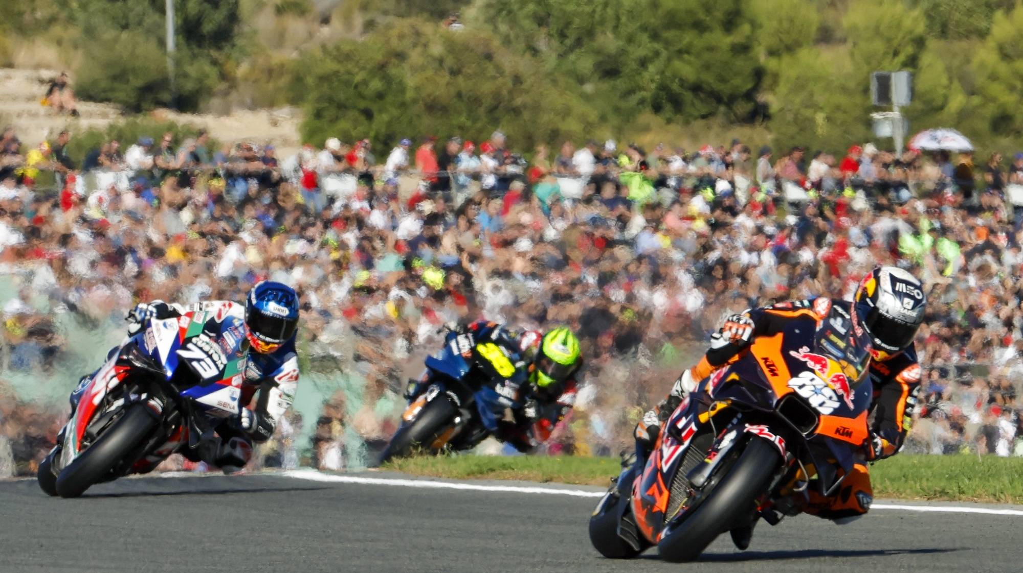 epa10287839 (L-R) Moto GP riders Alex Marquez, Cal Crutchlow and Miguel Oliveira in action during the official training session at Ricardo Tormo Circuit in Cheste, Valencia, 05 November 2022. Comunidad Valenciana Motorciclyng Grand Prix, the last Grand Prix of the season, runs on 06 November 2022.  EPA/BIEL ALINO